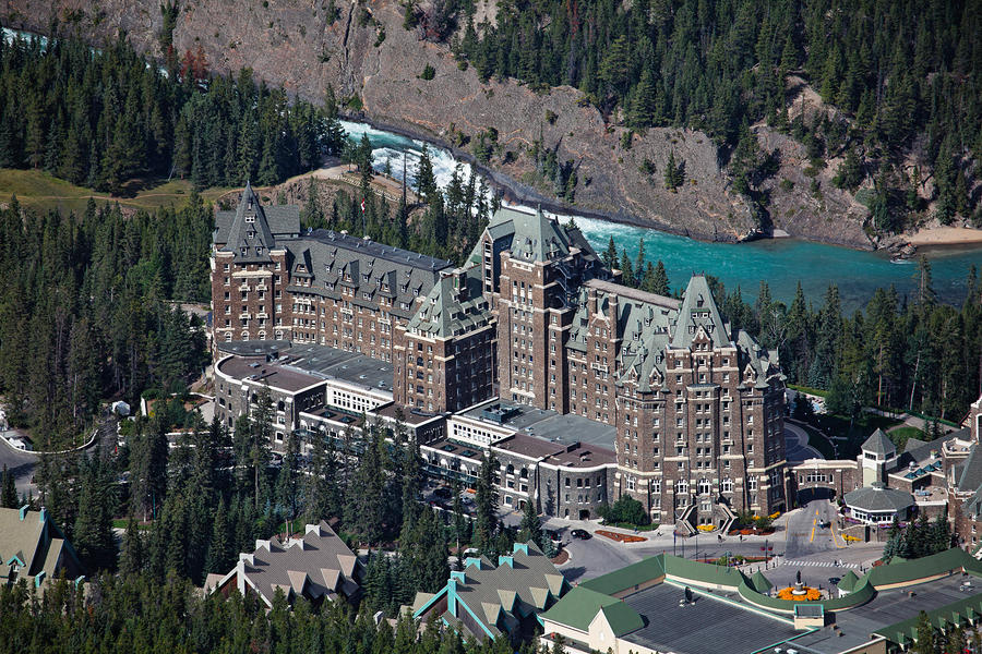 fairmont-banff-springs-hotel-with-the-bow-river-falls-banff-alberta-canada-george-oze