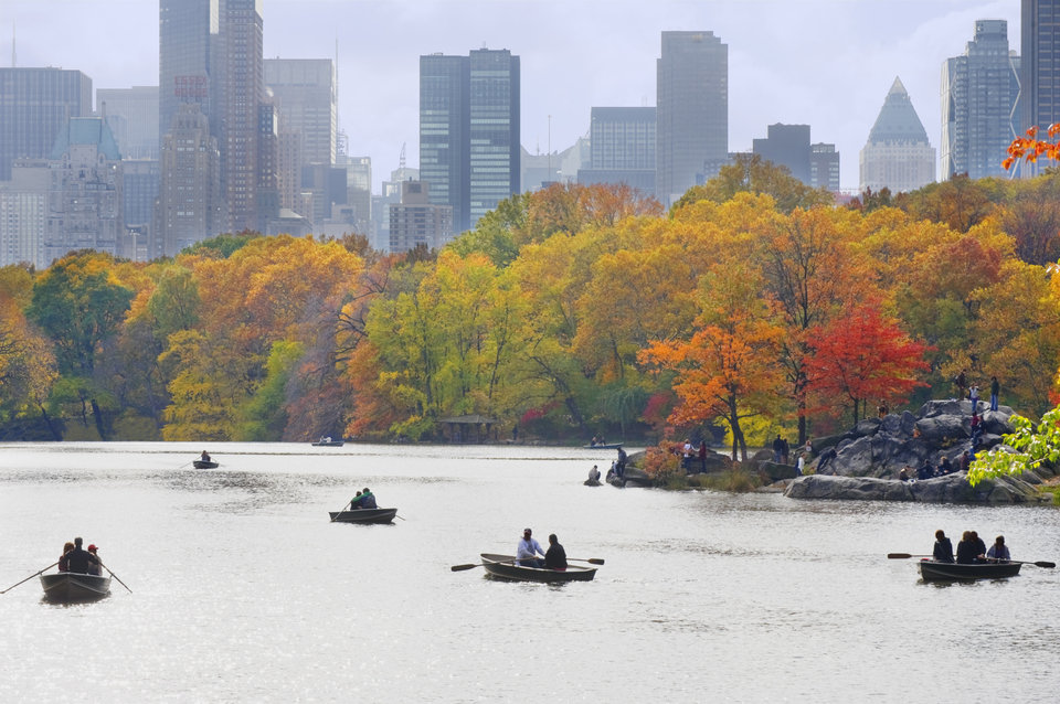 People in boats on lake in Central Park
