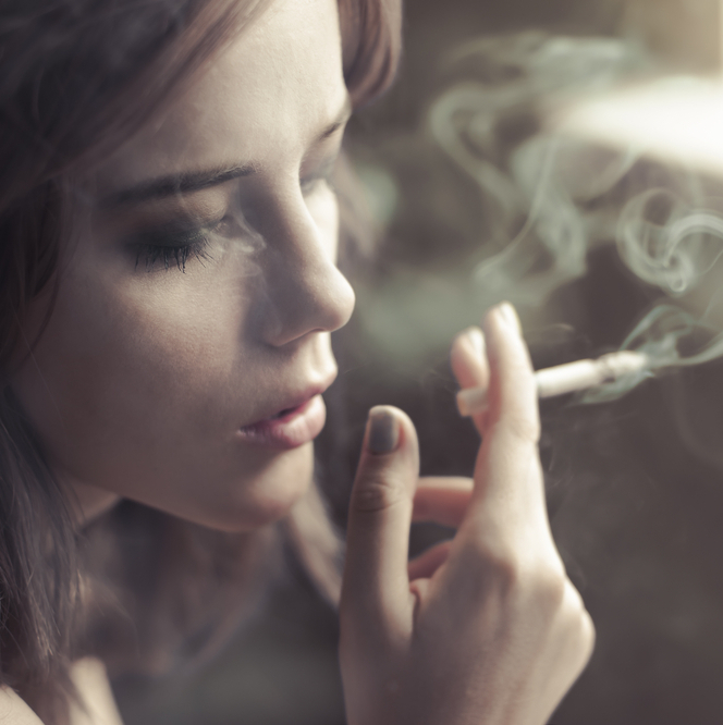 Teen-girl-smoking-cropped-shutterstock_108536432