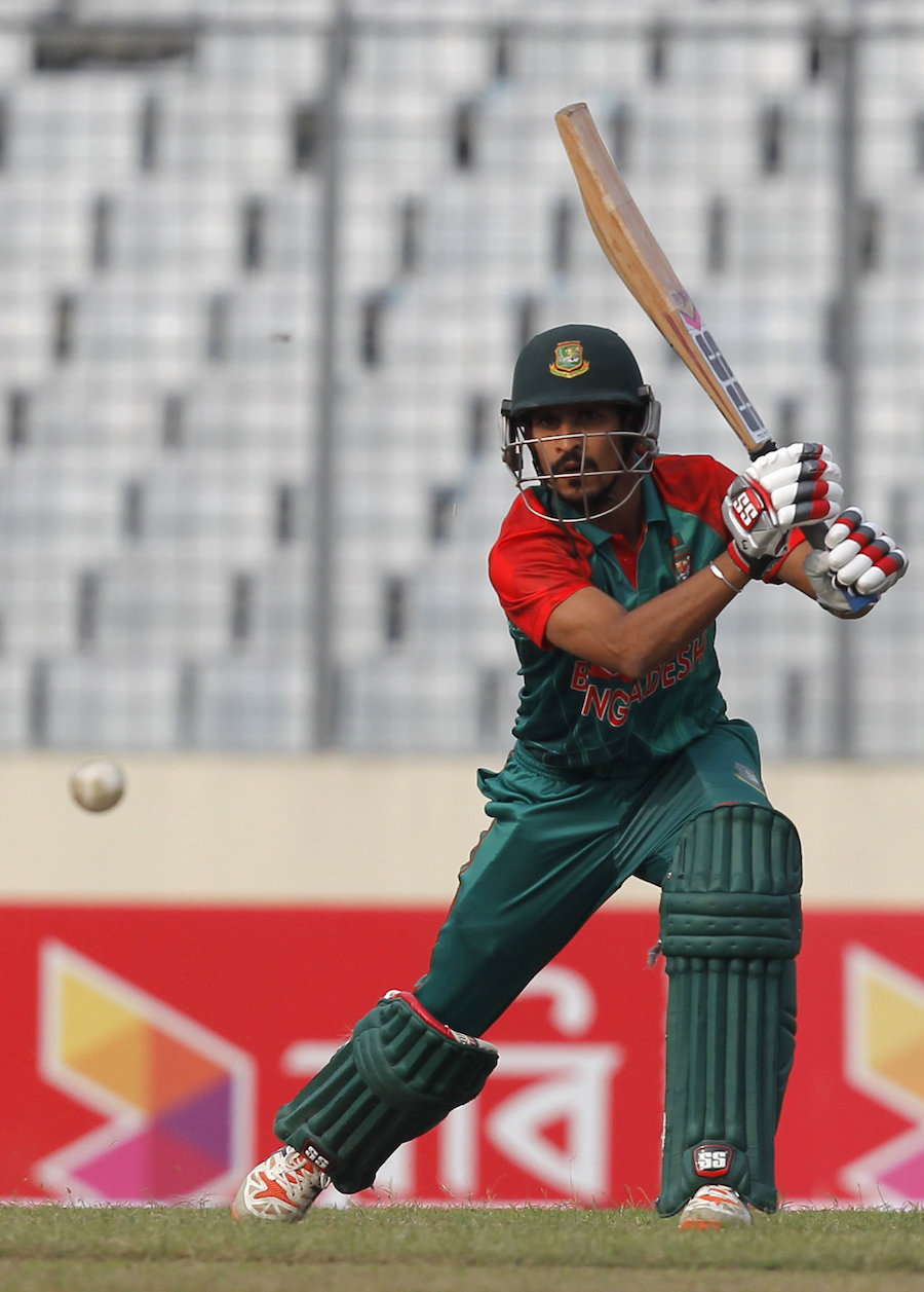 Bangladesh's Nasir Hossain plays a shot  during the second one day international cricket match against Zimbabwe, in Dhaka, Bangladesh, Monday, Nov. 9, 2015. (AP Photo/A.M. Ahad)